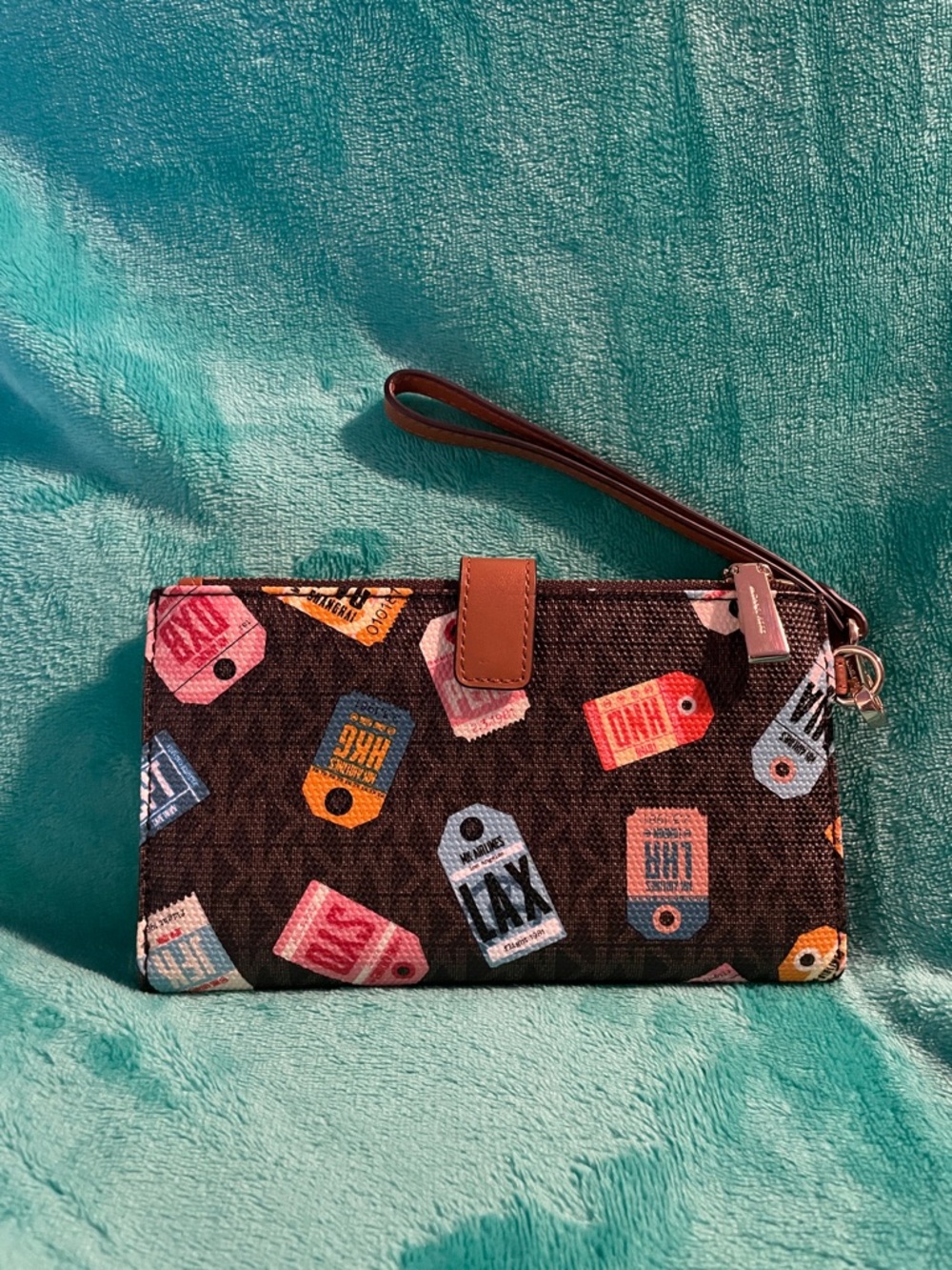 Michael Kors Brown Signature Wristlet with Multicolor Tag Print and Tan Strap - Picture 2 of 3